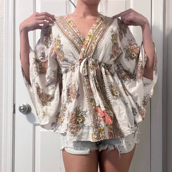 Angie V-Neck Flutter Sleeve Tie Front Top - Picture 5 of 16